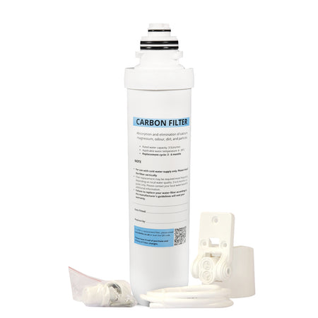 Carbon filter cartridge kit with white housing pieces, tubing, and small bagged parts