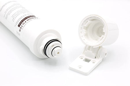 Carbon filter cartridge with exposed end and white mounting base housing
