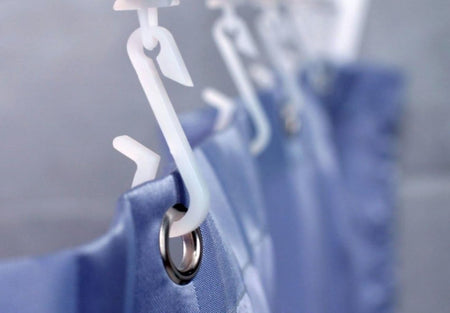 Shower curtain hook with metal eyelet and plastic glider