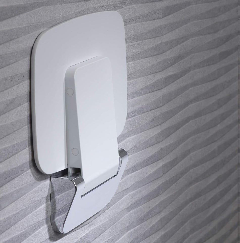 Wall-mounted white shower seat bracket with folding support arm