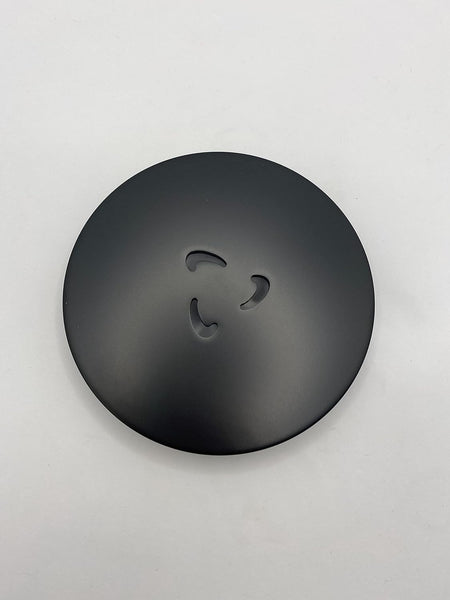 Matt black round waste cover with three-lobed opening control