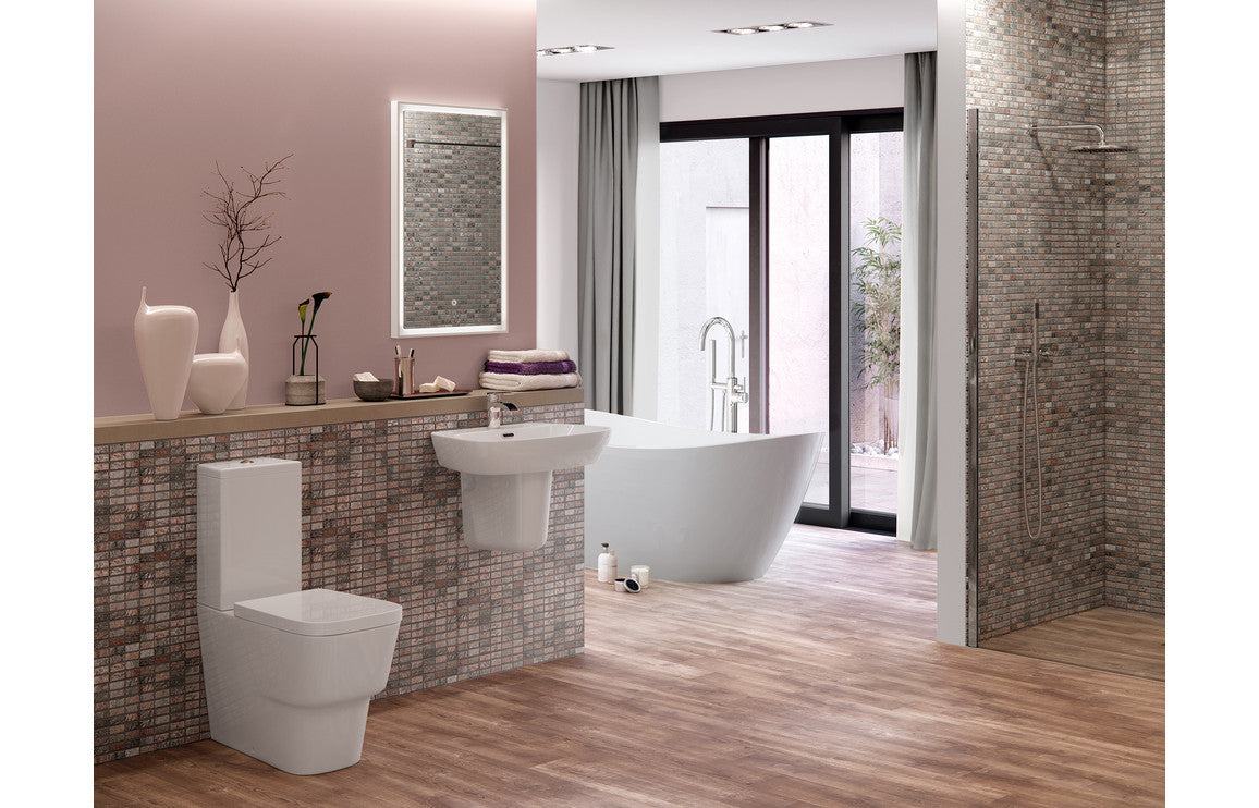 White semi-pedestal basin with faucet, installed view in bathroom