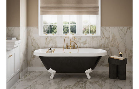 White vanity unit with integrated basin beneath window