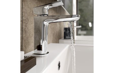 Chrome single-hole basin mixer with curved spout and lever handle