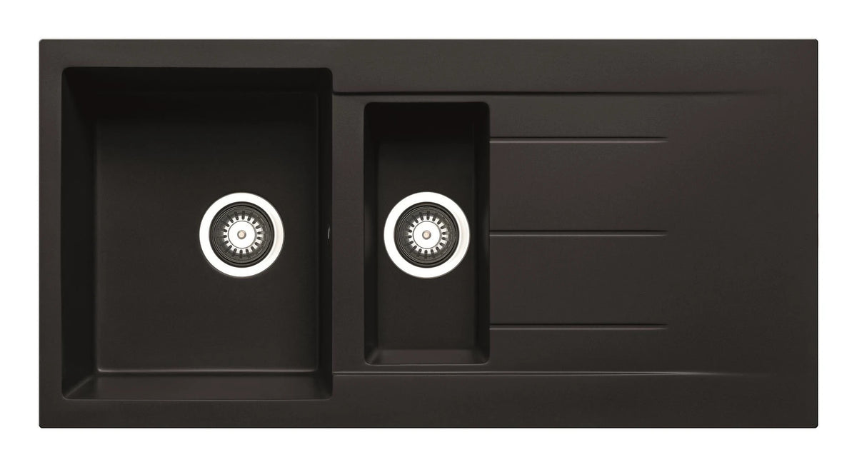 Black inset granite sink with two circular faucet controls and drain channel