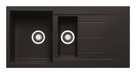 Black inset granite sink with two circular faucet controls and drain channel