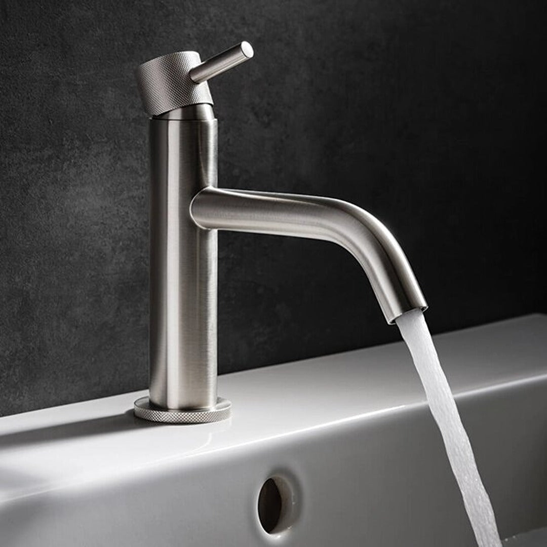 Brushed steel basin mixer tap with knurled lever, tall body, and curved spout