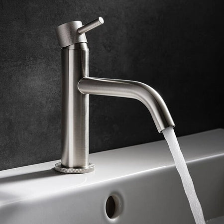 Brushed steel basin mixer tap with knurled lever, tall body, and curved spout