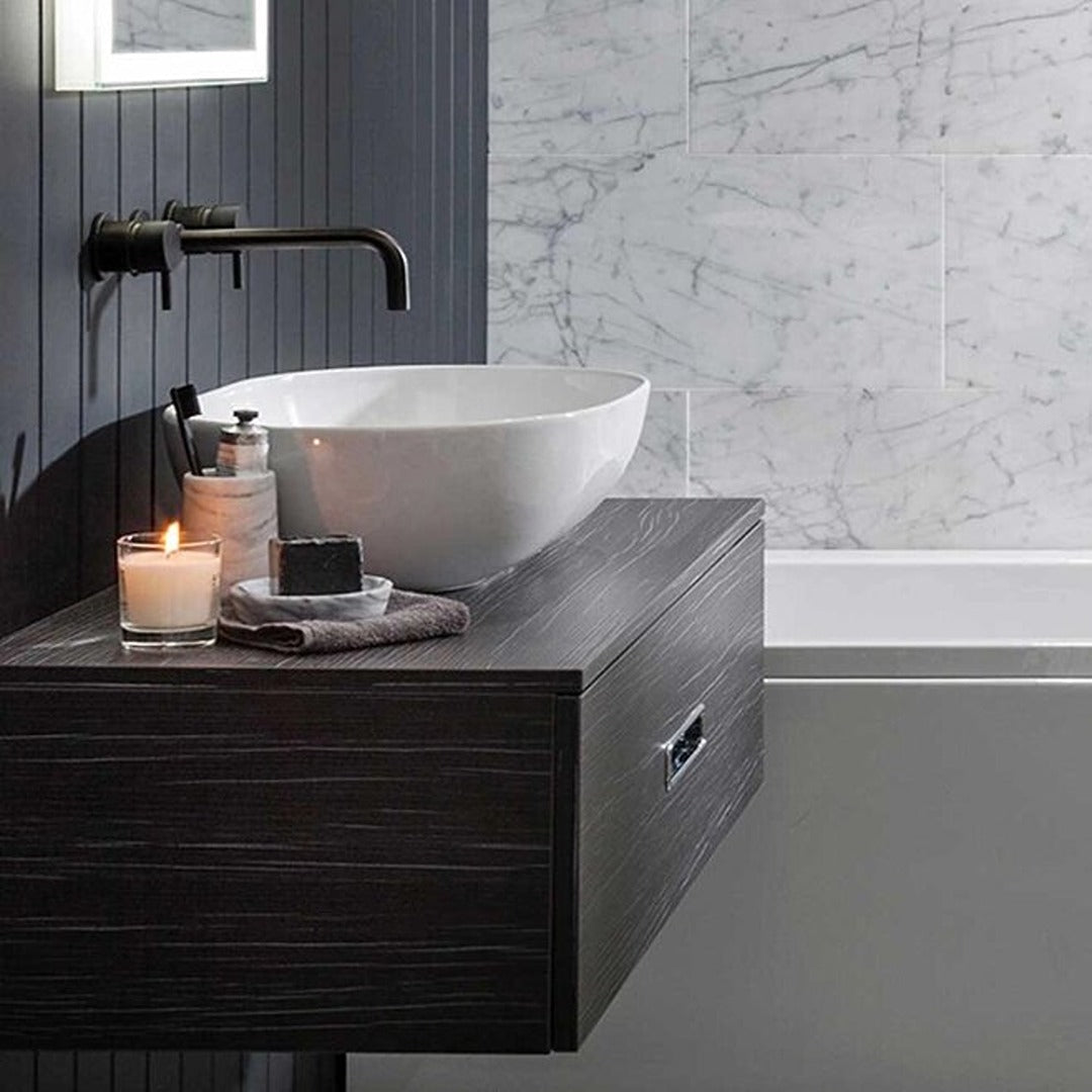 Wall-mounted black basin mixer with twin lever handles and curved spout