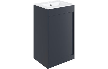 Matt indigo blue floor standing vanity unit with integrated white basin and tap hole