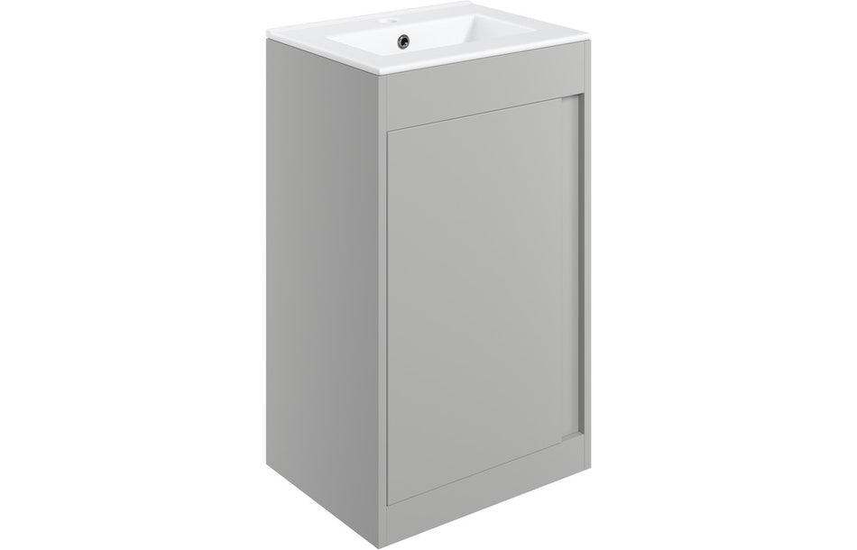Matt light grey floor-standing vanity unit with built-in rectangular basin