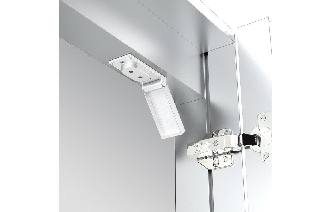 Front-lit LED mirror cabinet hinge detail with mounted LED module and power connection