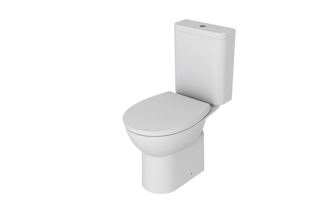 White close-coupled toilet with soft-close seat, rimless design