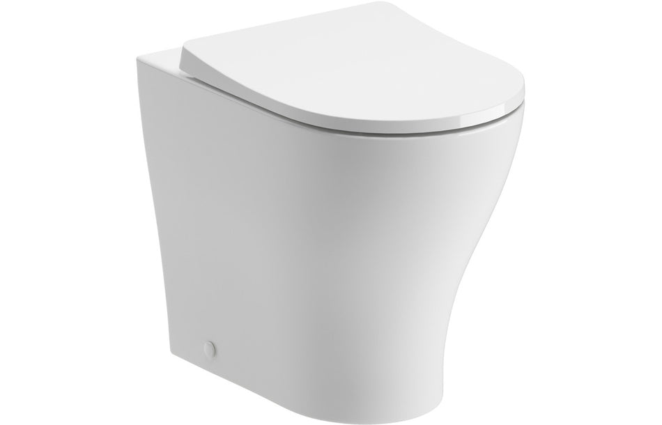 Rimless back-to-wall WC with soft-close seat, white ceramic, closed lid
