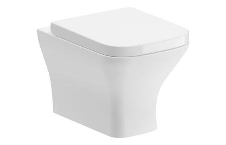 White back-to-wall toilet with slim soft-close seat, front view