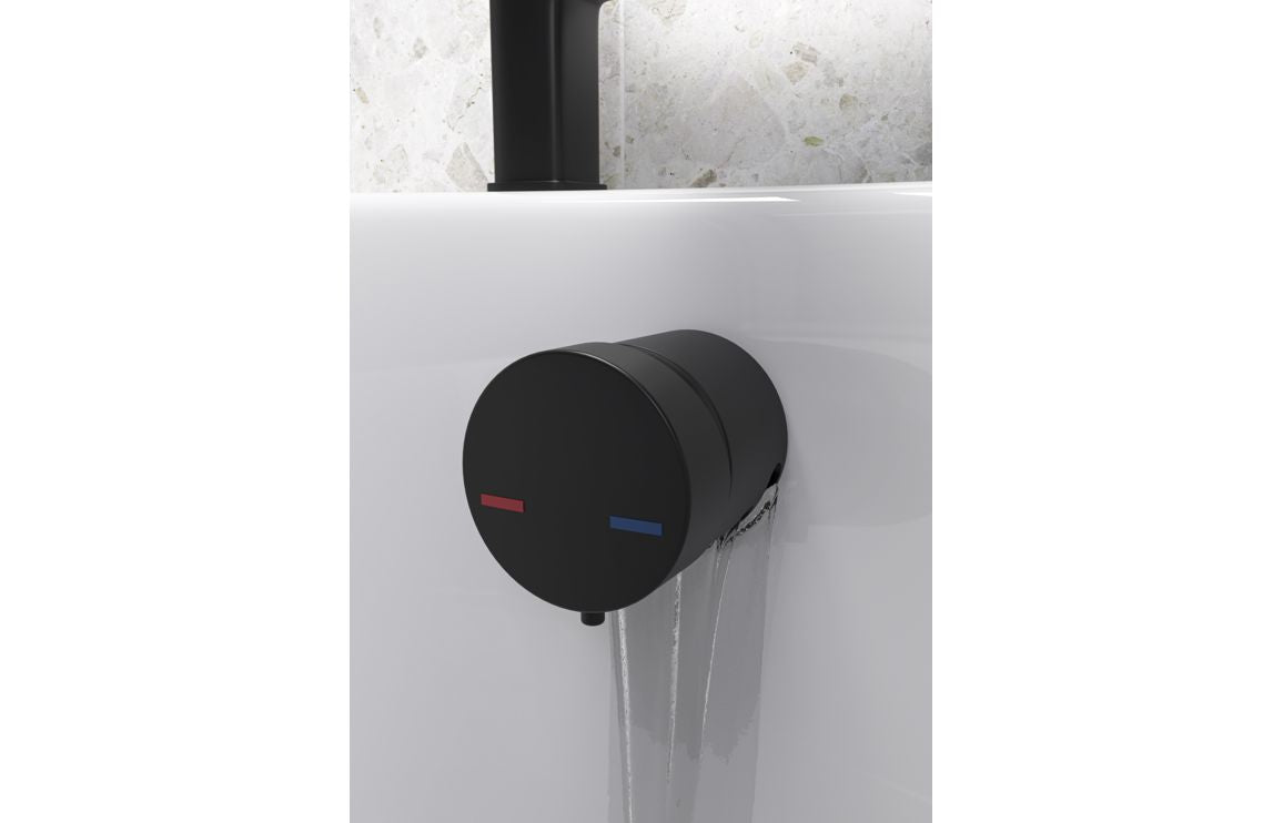 Black overflow filler with integrated valve and circular cover for bathtub overflow outlet