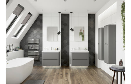 Matt gray vanity basin unit with 2 drawers and curved white ceramic basin in bathroom