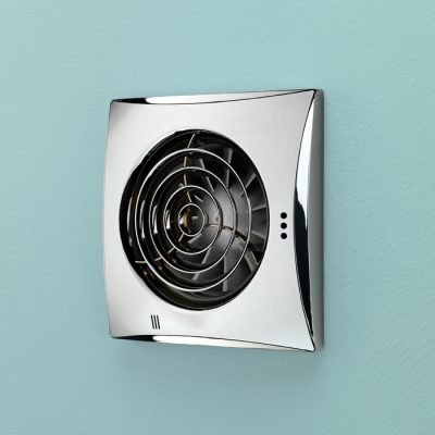 Wall-mounted extractor fan with timer, white faceplate and black fan grille