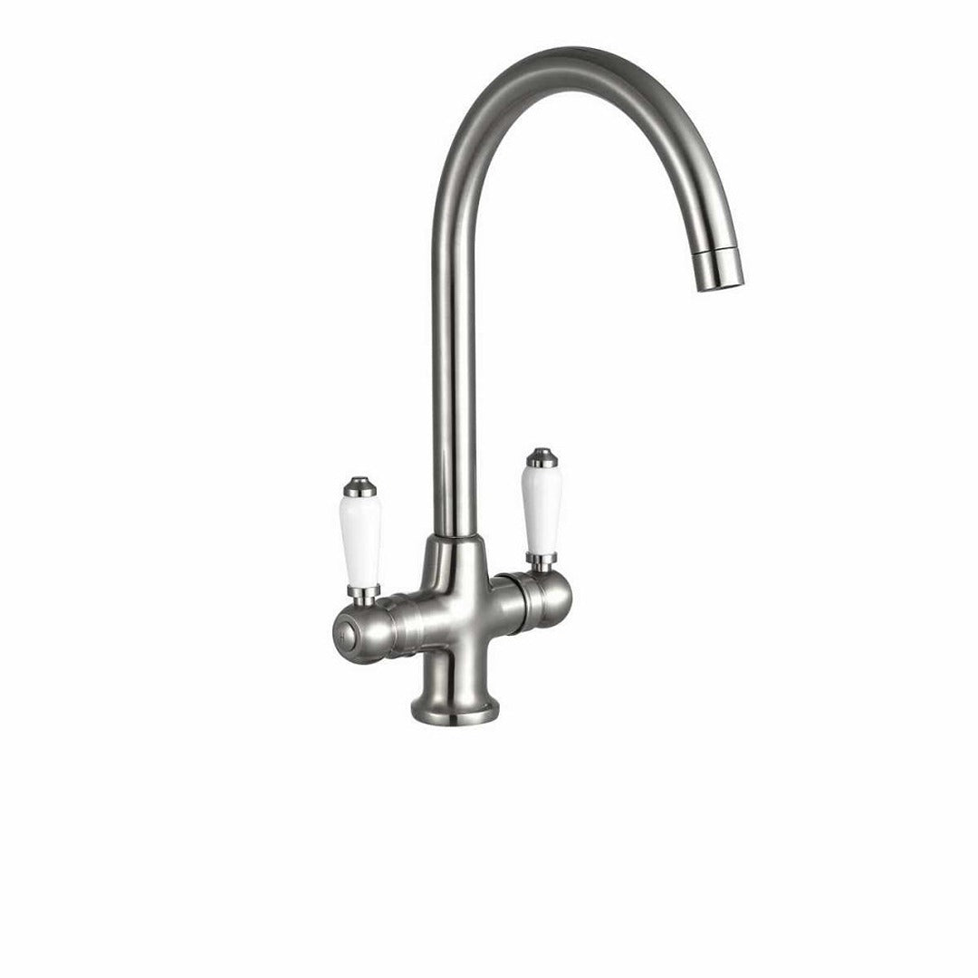 Traditional kitchen sink mixer tap with brushed steel finish and curved spout, two white handles