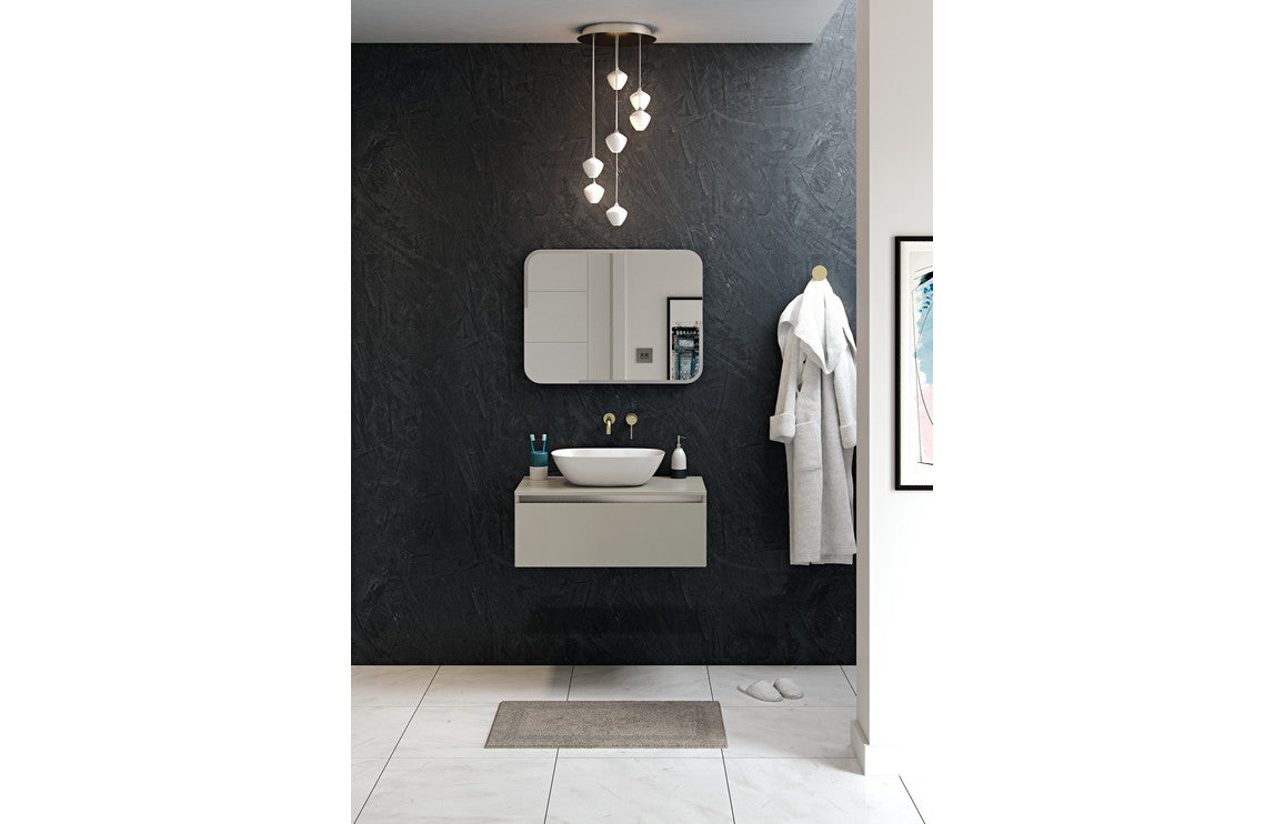 White resin washbowl on bathroom vanity countertop