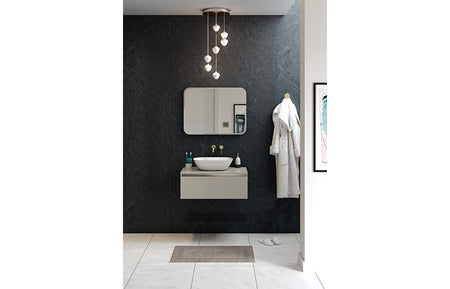 White resin washbowl on bathroom vanity countertop