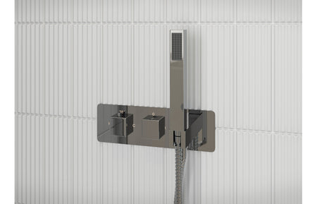 Chrome shower valve with dual outlet controls and vertical handheld hose
