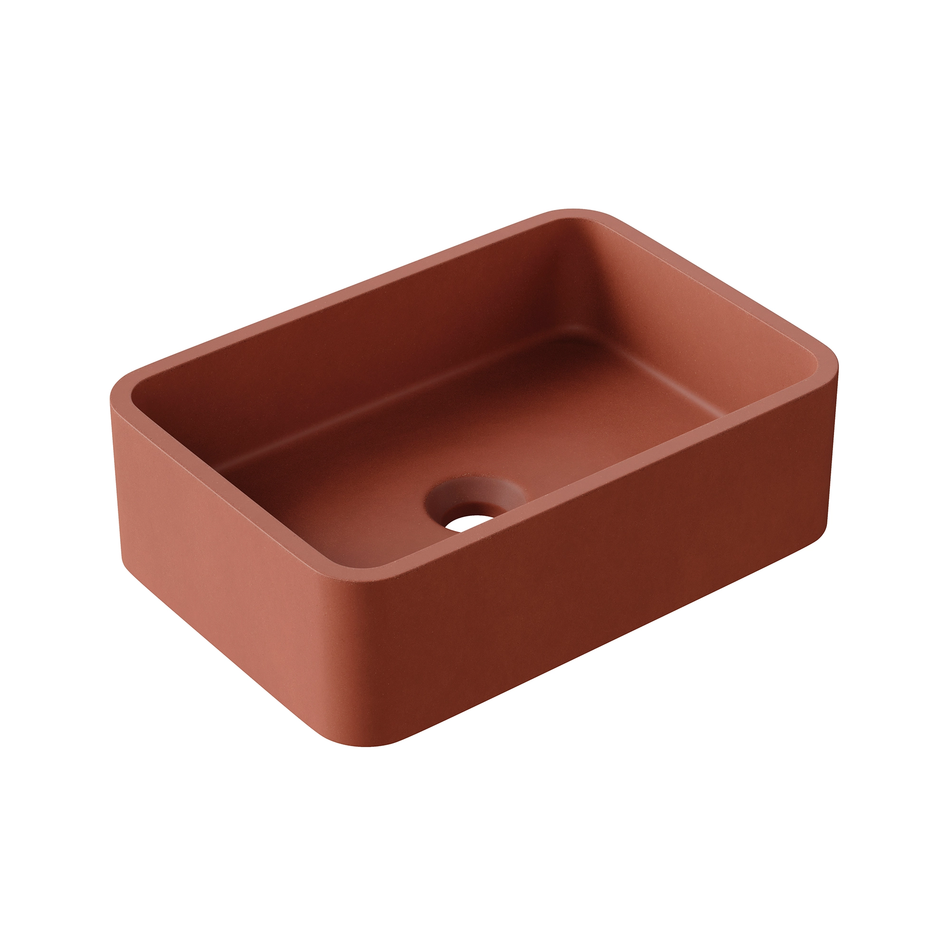 Brick red concrete vessel basin with square bowl and round drain opening