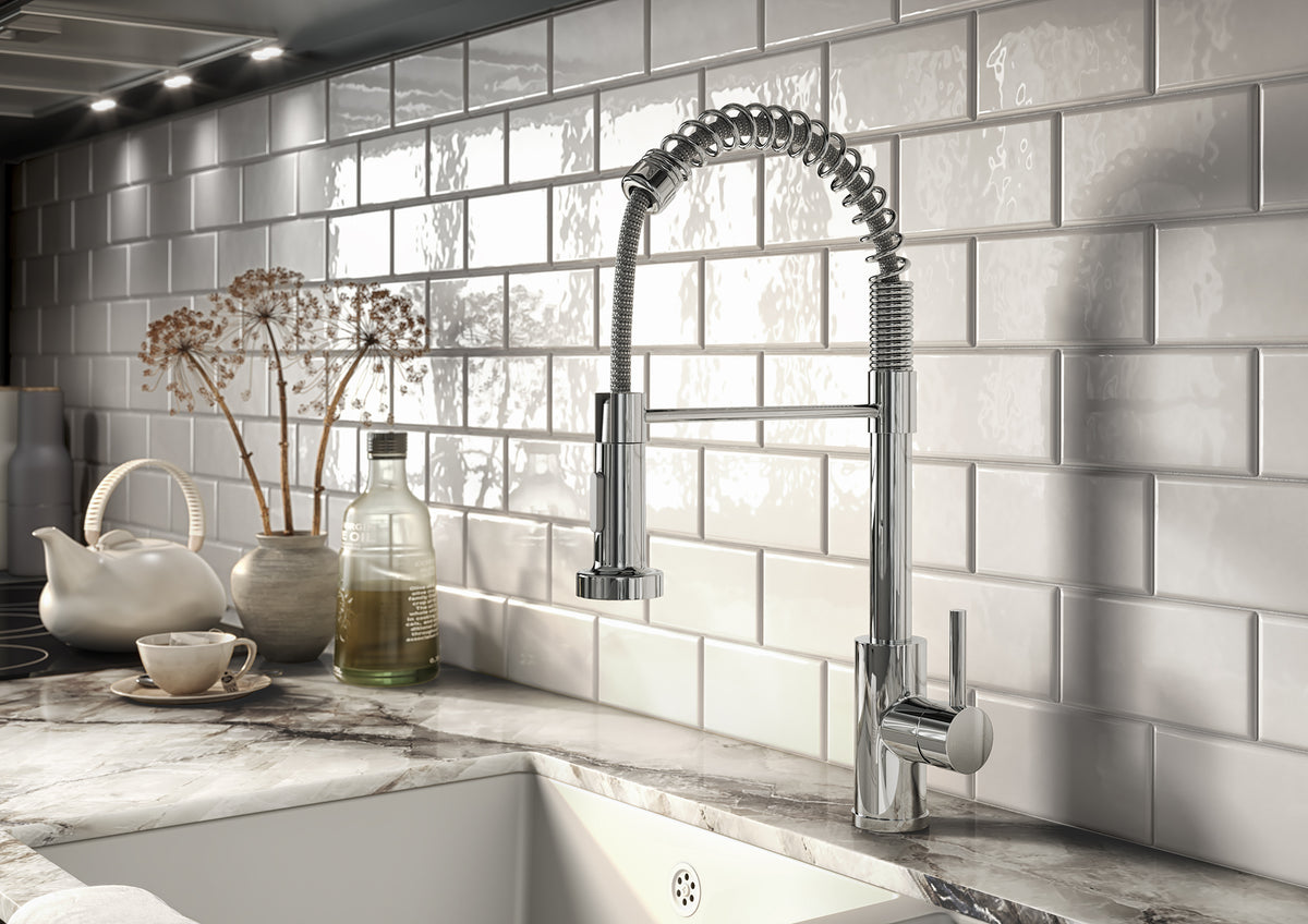 Chrome kitchen mixer tap with pull-out spray hose and lever handle