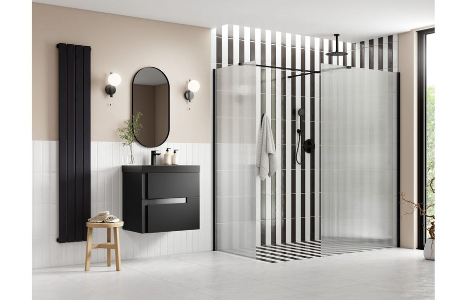 Black fluted wetroom glass panel with wall support arm