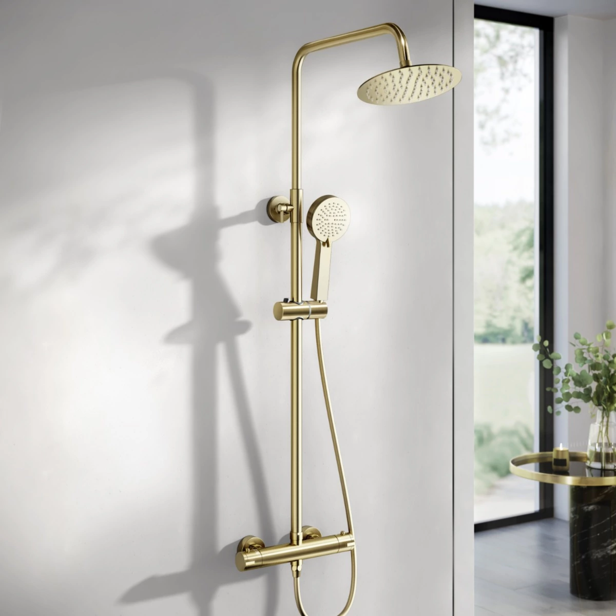 Brushed brass thermostatic shower set with round overhead and handheld shower heads