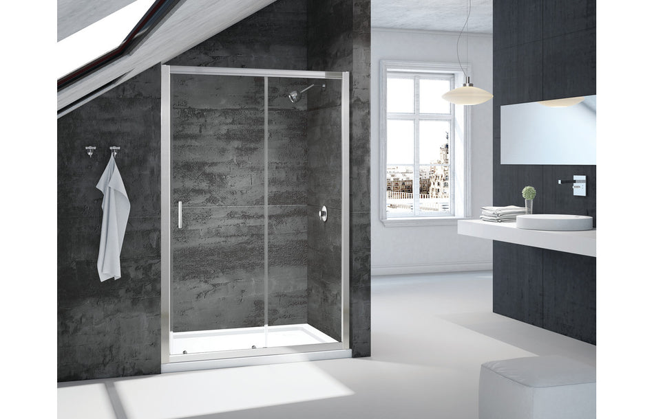Chrome framed sliding shower door with clear glass panels and chrome handles