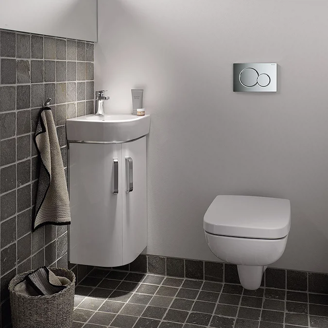 Gloss chrome dual flush plate with two round buttons for concealed cistern