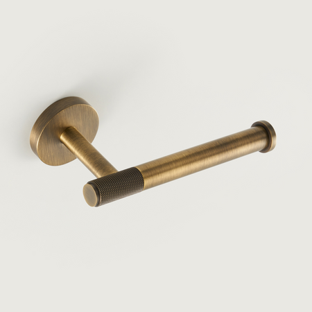 Brushed brass towel rail with round wall mount and textured center handle